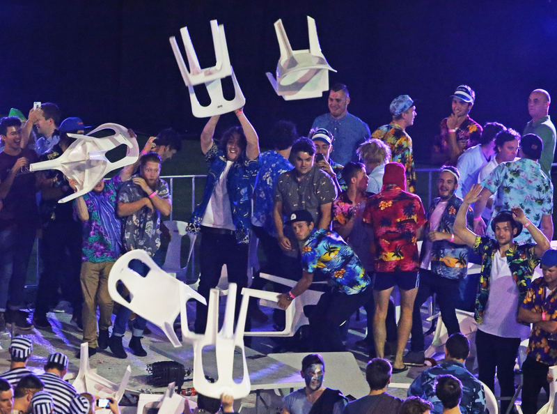 Illustration for article titled Rioting Costumed Fans Halt Australian Darts Competition